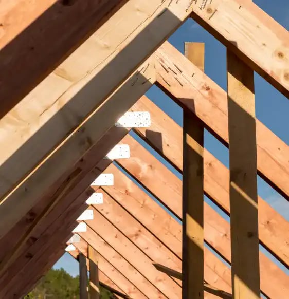 Wooden beams of home in construction.